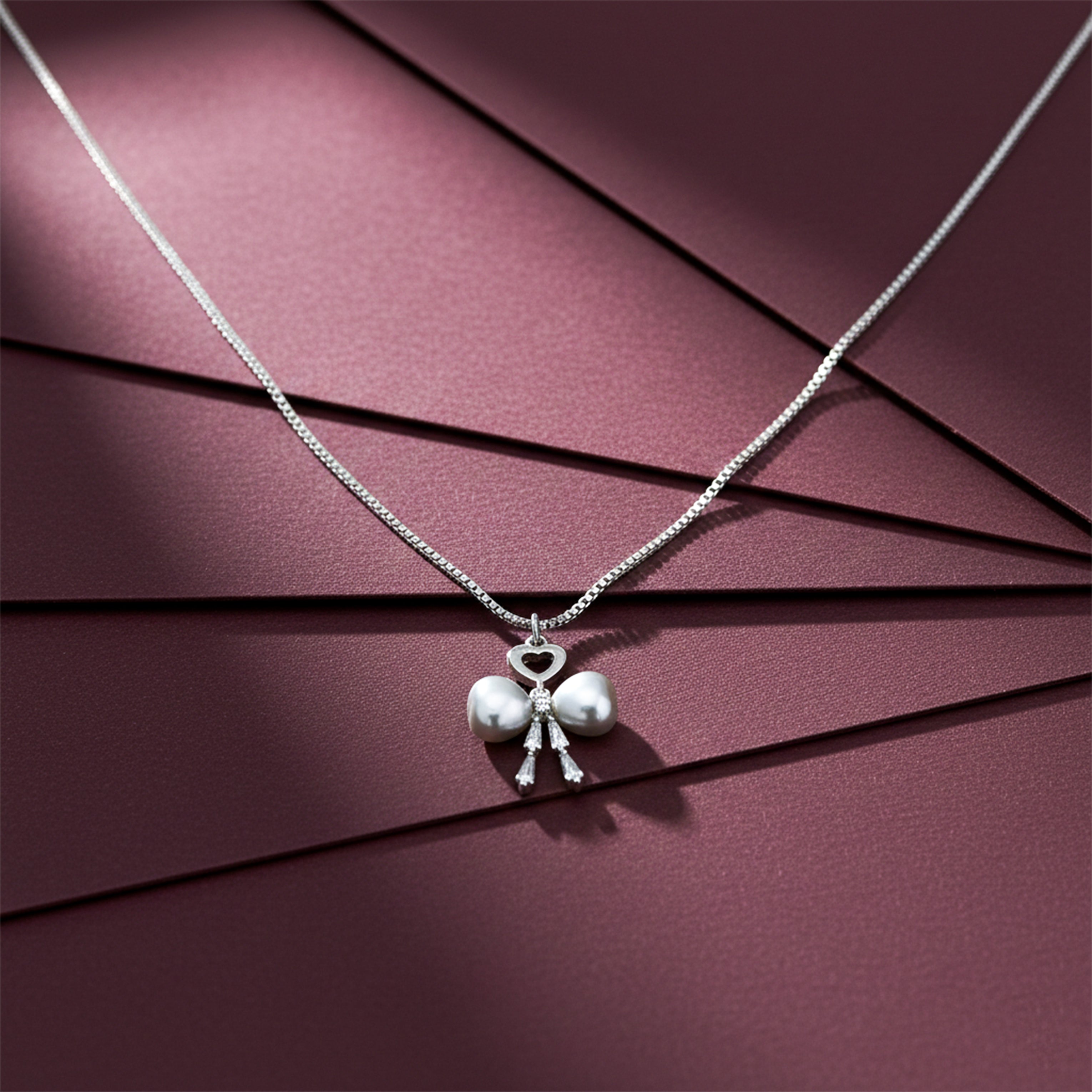 Elegant Bow Tie Pearl Pendant GWN -52