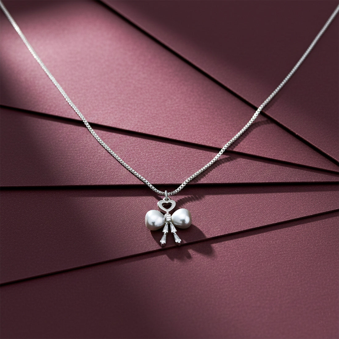 Elegant Bow Tie Pearl Pendant GWN -52