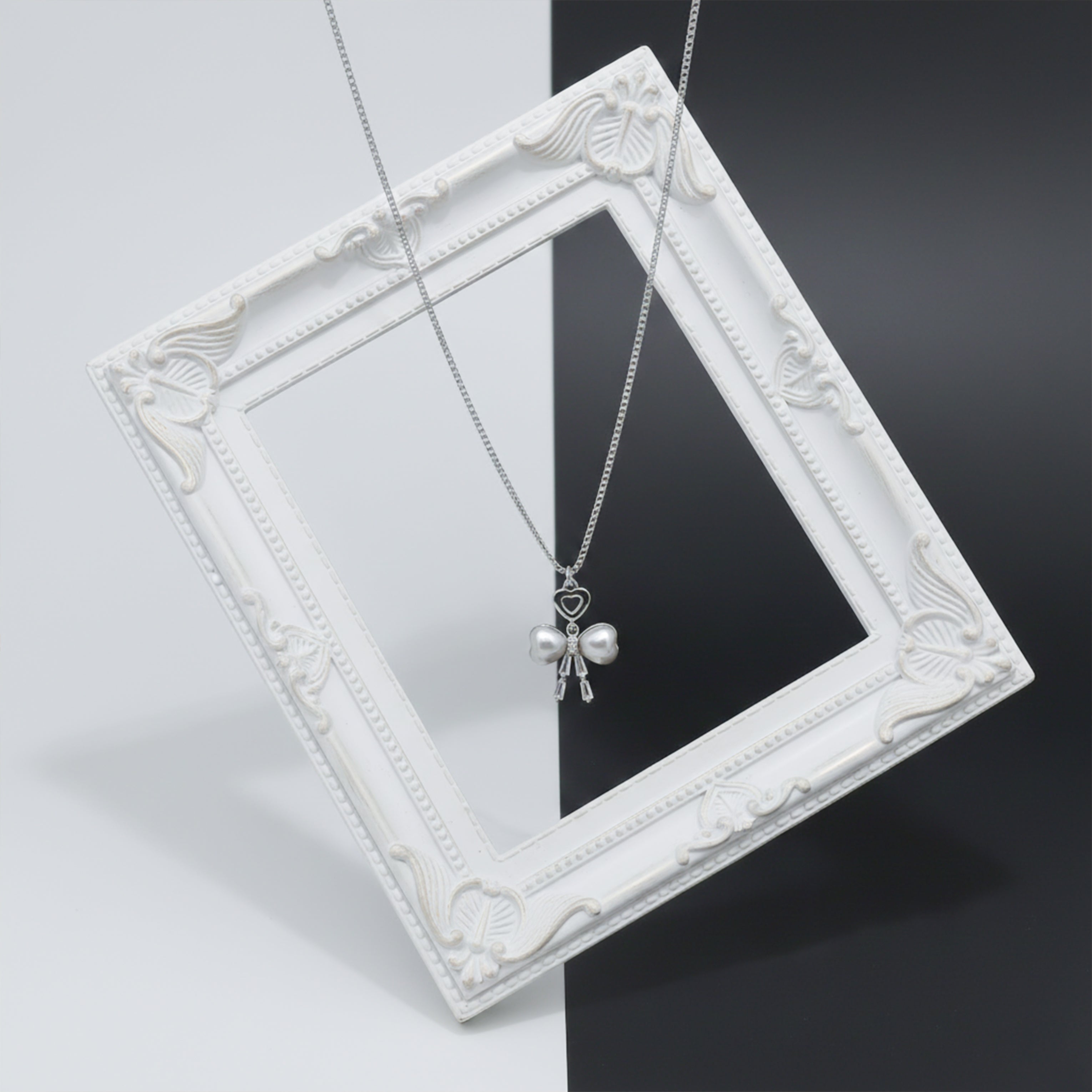 Elegant Bow Tie Pearl Pendant GWN -52